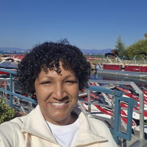 Dimika smiling on vacation